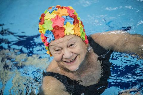 Woman in water swimming