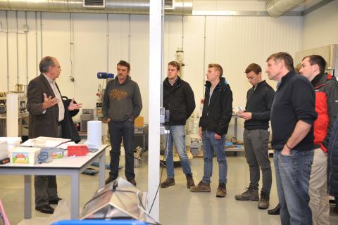 dr joe gallagher in lab with farmers