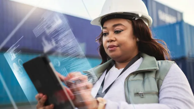 Engineer using a digital tablet