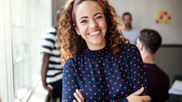 Female business owner smiling