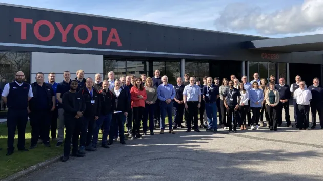 Toyota - people standing outside