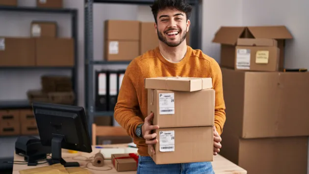 small business owner - online business, packing boxes 