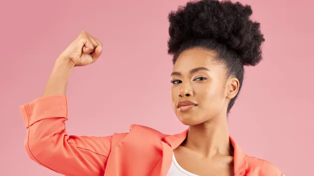 woman flexing arm 