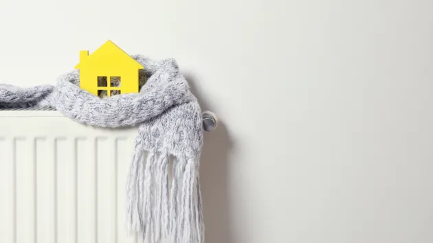 radiator, scarf around a yellow house 