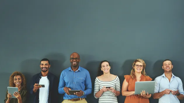 group of people using laptops 