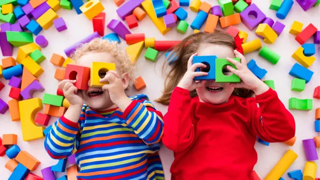 children playing with building blocks