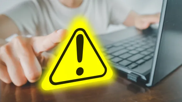 laptop and exclamation mark 