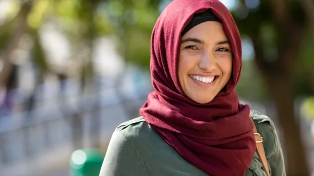 Muslim woman in an office wearing a hijab