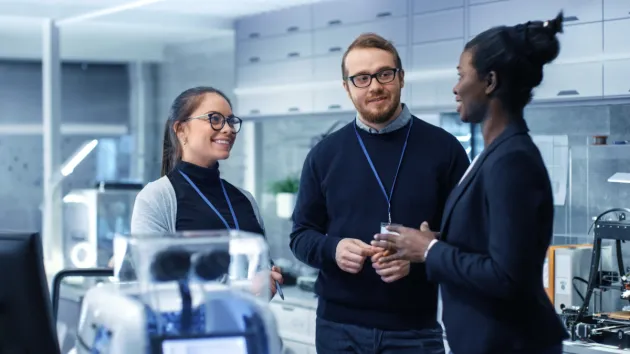 male and female scientists in a laboratory