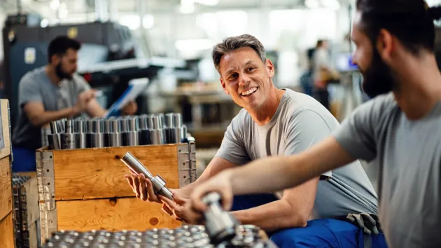 Workers in a steel factory