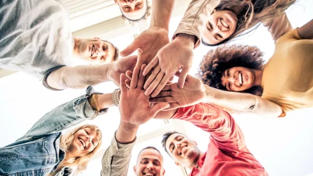 group of young adults smiling