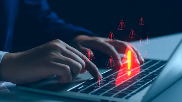 Laptop - warning sign, exclamation mark in a red triangle