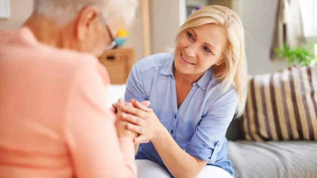 Person caring for an elderly relative