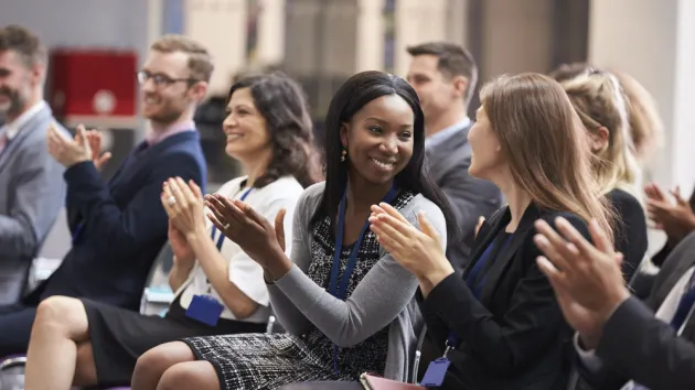 group of people clapping