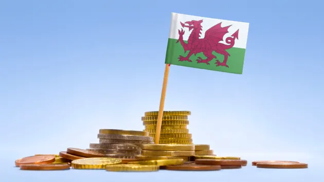 coins and Welsh flag