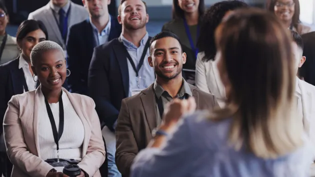 business conference - delegates applauding 