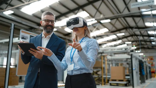 Engineers using VR headsets