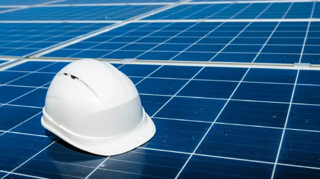 Solar panels and hard hat