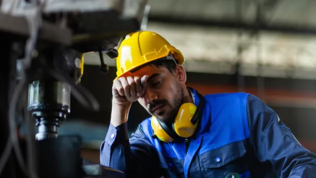 Stressed factory worker 