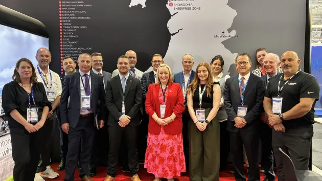 Team Wales - including the Cabinet Secretary for Economy, Energy and Planning, Rebecca Evans - at the stand at Paris Airshow