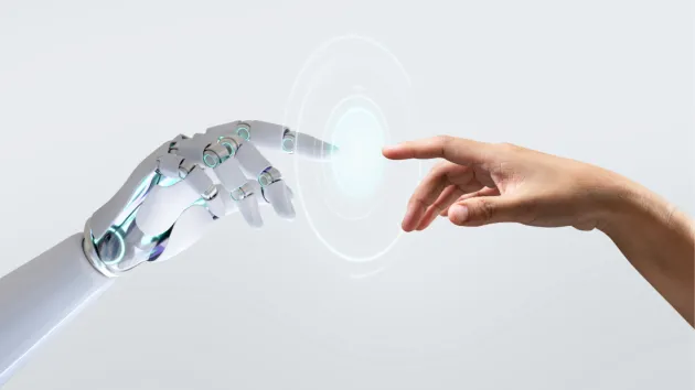 robot hand and human hand 