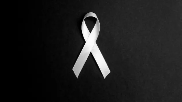 White ribbon on a black background 
