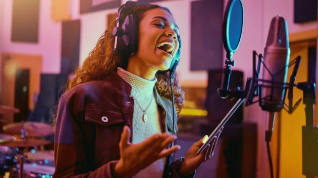 recording artist - singer in a studio