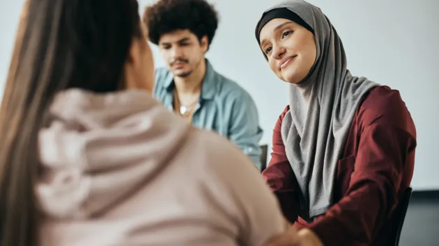 people talking at a support group