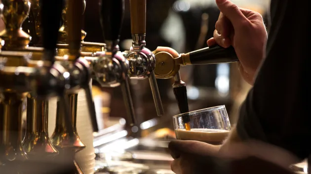 Pub - pouring beer into a glass