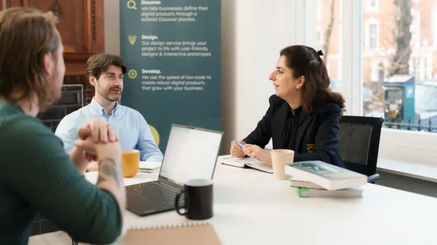 People discussing at a table