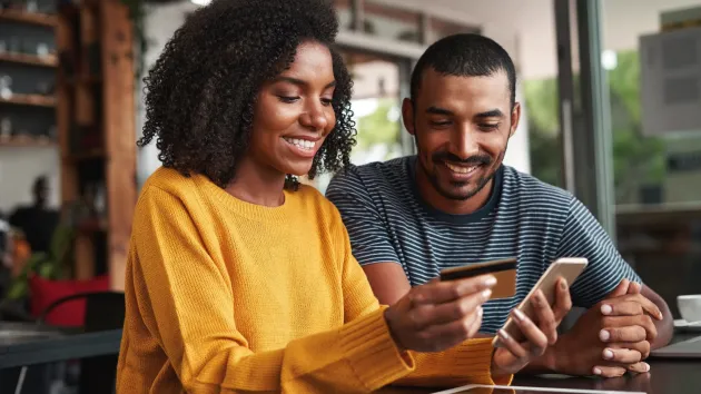 couple online shopping - paying for goods 
