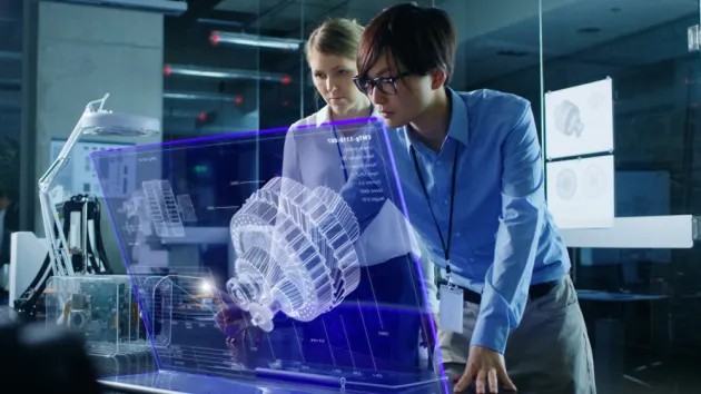 Engineers Have Discussion while Using Modern Computer With Transparent Holographic Display.