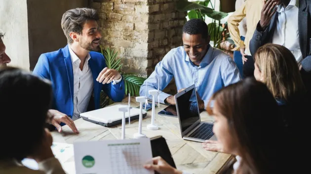 business people working on sustainable innovation project - Green renewable energy concept
