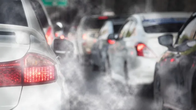 Cars with exhaust fumes