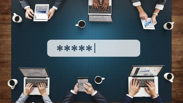people using a laptop