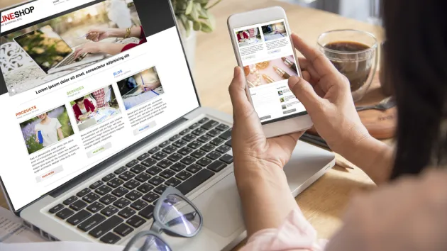 Online Shopping Website on Laptop.