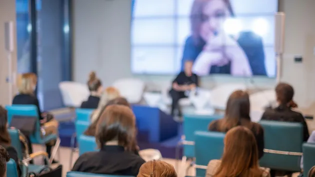 Students watching an online event