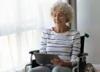 Mature woman using a digital device 