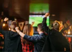 People watching football in a pub 
