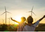 Family looking at wind turbines
