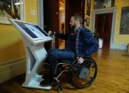 Wheelchair user at a museum