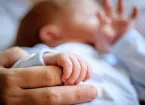 baby and adult hands