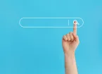 blue background, hand and search bar 