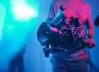 close up of camera and film crew 