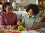 parent and teenager saving money in piggy bank 