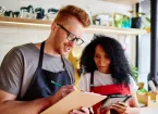 male and female colleagues working, concept of employee ownership