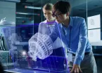 Engineers Have Discussion while Using Modern Computer With Transparent Holographic Display. 