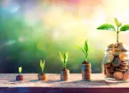 stacks of coins with plant shoots
