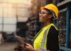Female engineer worker enjoy working in factory industry.