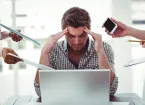 Businessman stressed out at work in casual office